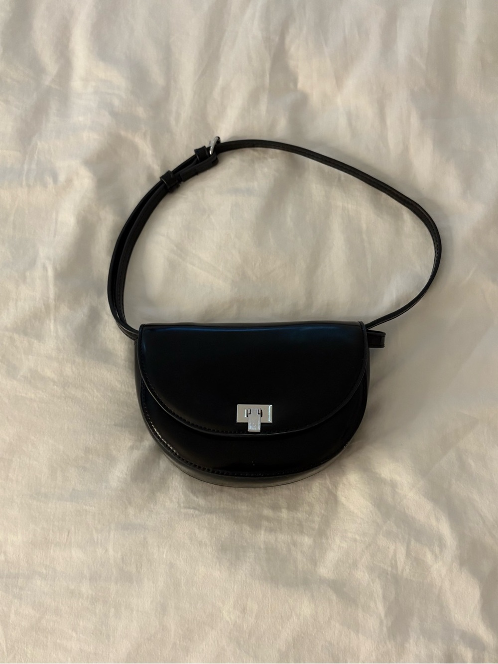 Black Faux Leather Crossbody Saddle Bag with Silver Clasp